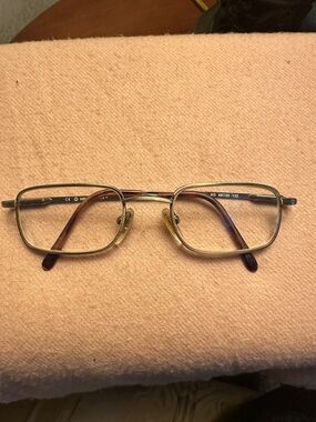Harley Davidson prescription reading glasses.Gold with tortoise arms.
